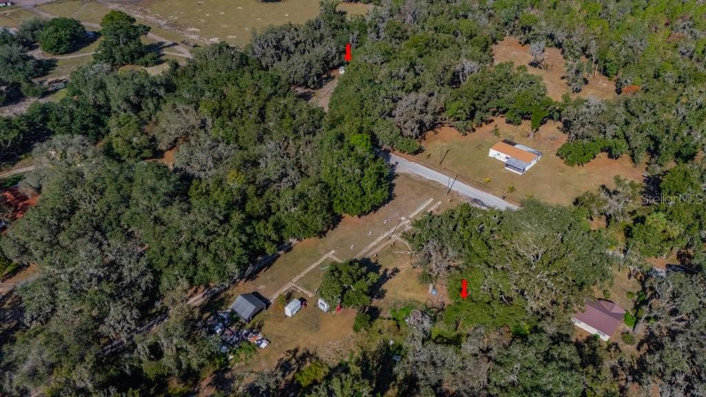 415 Hal Colding Road Lithia, FL 33547 - Photo 19 of 73 an aerial view of a house with a yard