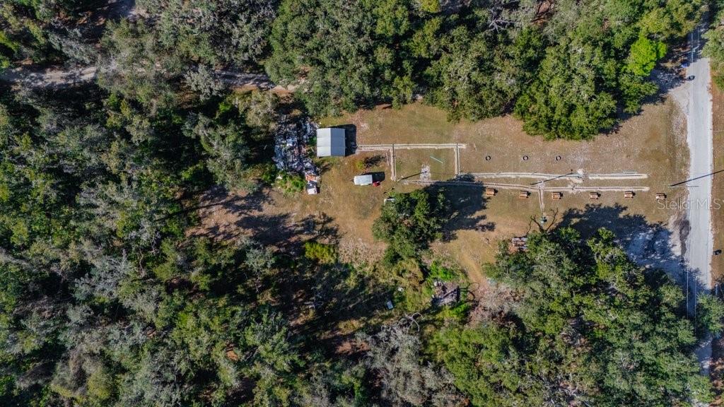 415 Hal Colding Road Lithia, FL 33547 - Photo 21 of 73 an aerial view of a house with a yard