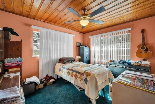 a view of outdoor space with deck and yard