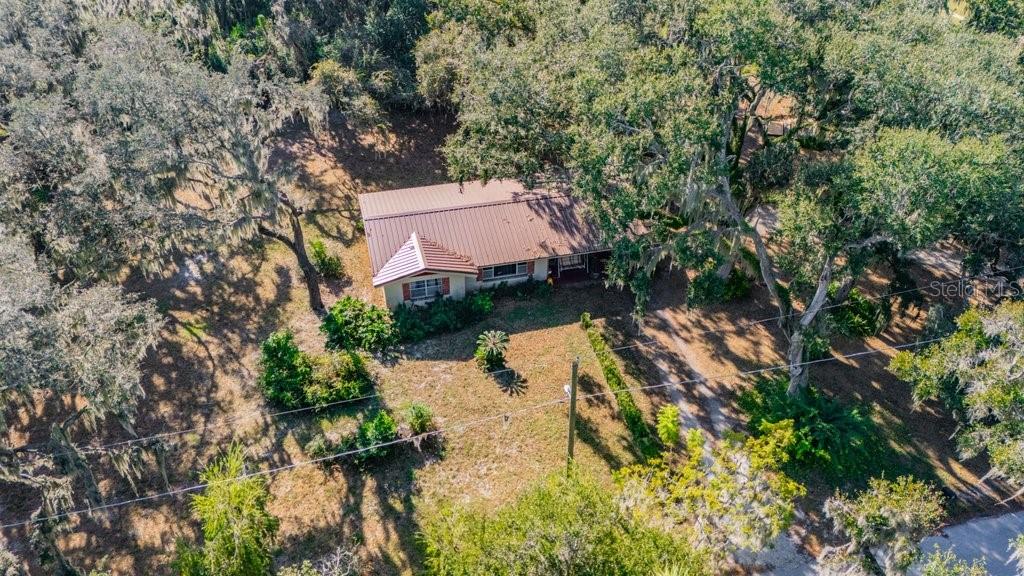 415 Hal Colding Road Lithia, FL 33547 - Photo 4 of 73 an aerial view of a house with a yard