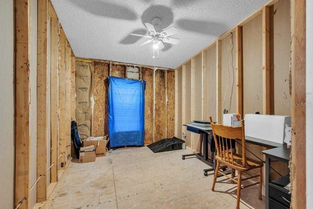 415 Hal Colding Road Lithia, FL 33547 - Photo 55 of 73 a view of a livingroom with furniture and a window