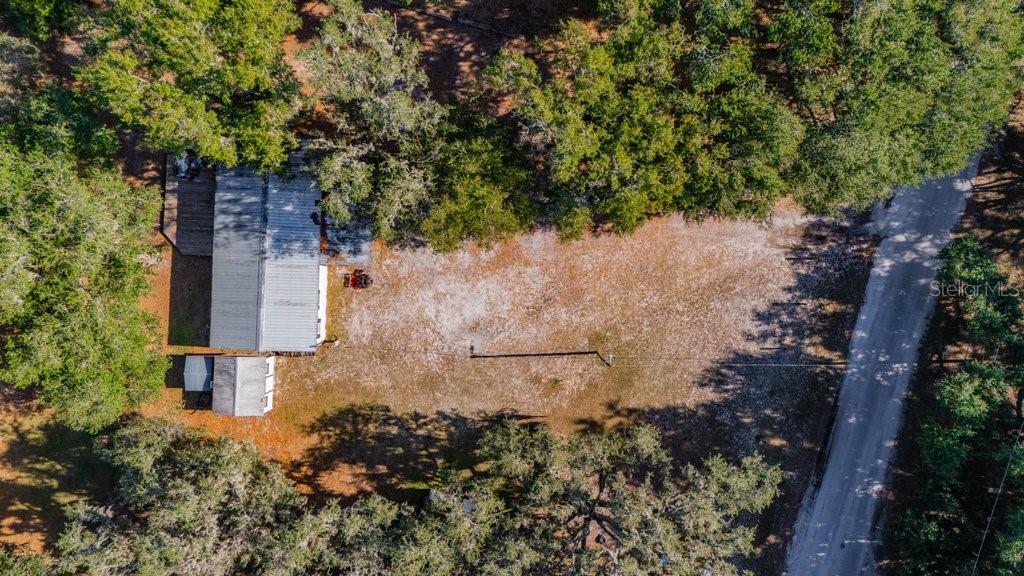 415 Hal Colding Road Lithia, FL 33547 - Photo 10 of 73 a aerial view of a house with a yard