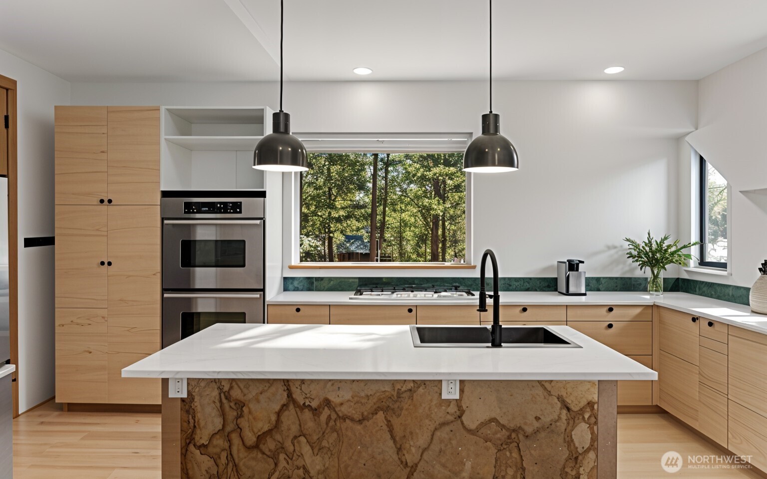 78 Homestead Road Winthrop, WA 98862 - Photo 15 of 40 a kitchen with a sink a counter top space appliances and cabinets
