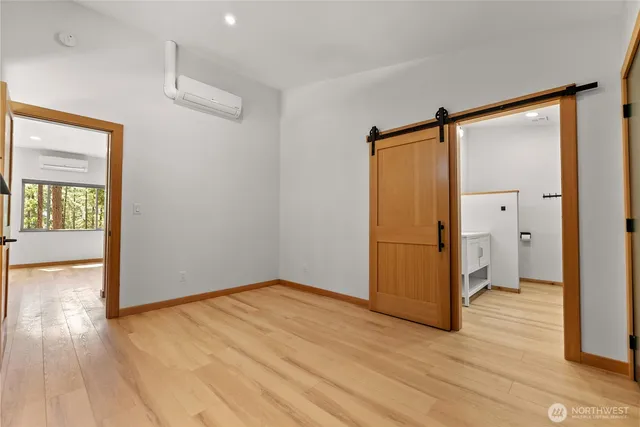 a bathroom with a bathtub and a sink