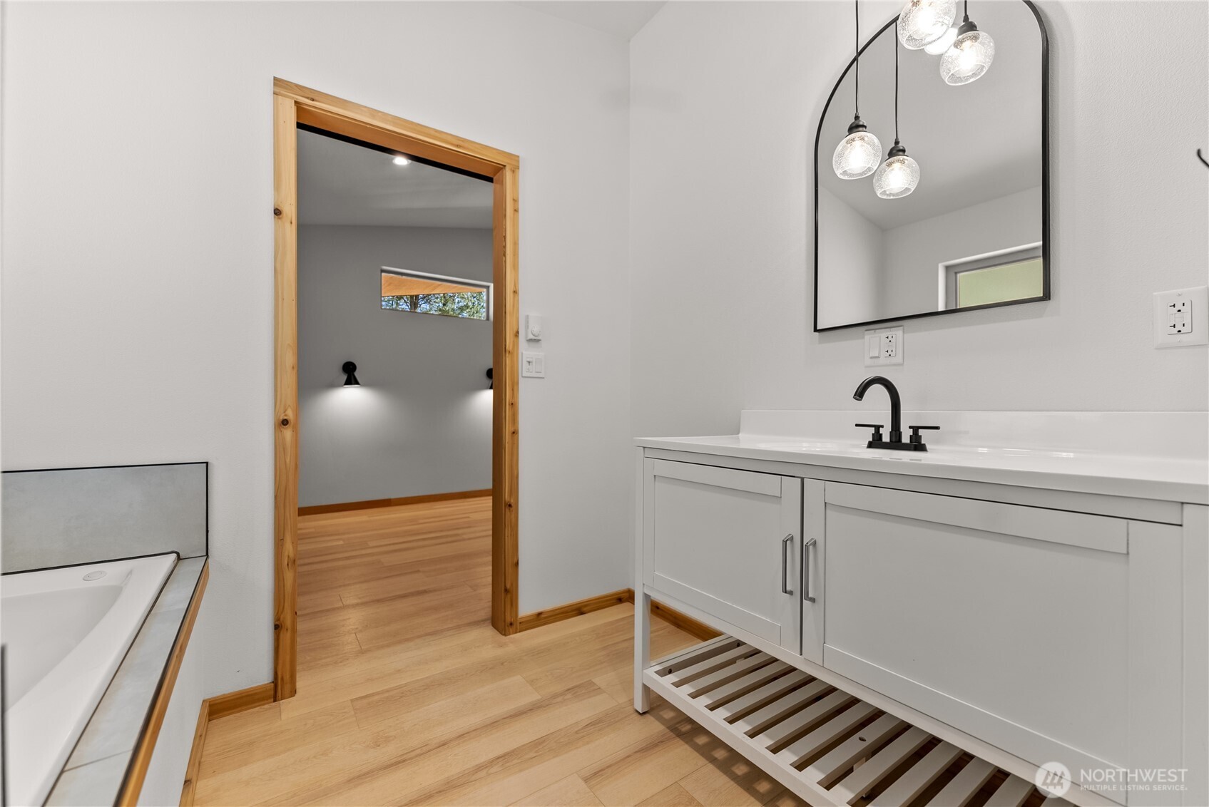 78 Homestead Road Winthrop, WA 98862 - Photo 25 of 40 a en suite bathroom with a sink and mirror