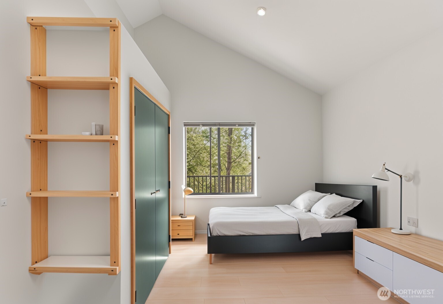 78 Homestead Road Winthrop, WA 98862 - Photo 29 of 40 a bedroom with a bed and a window