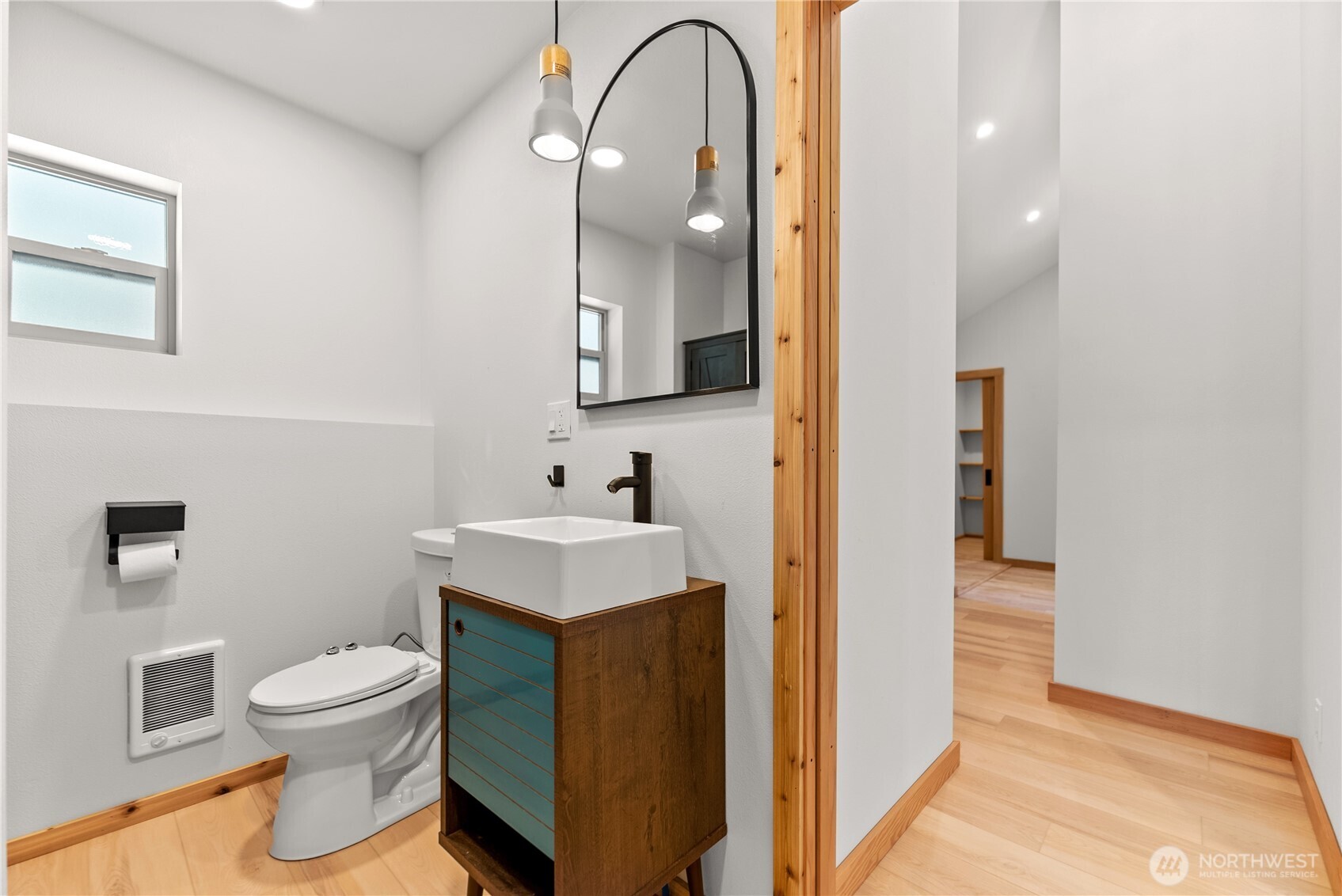 78 Homestead Road Winthrop, WA 98862 - Photo 33 of 40 a bathroom with a toilet sink and mirror