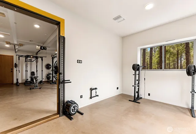 a view of a room with gym equipment