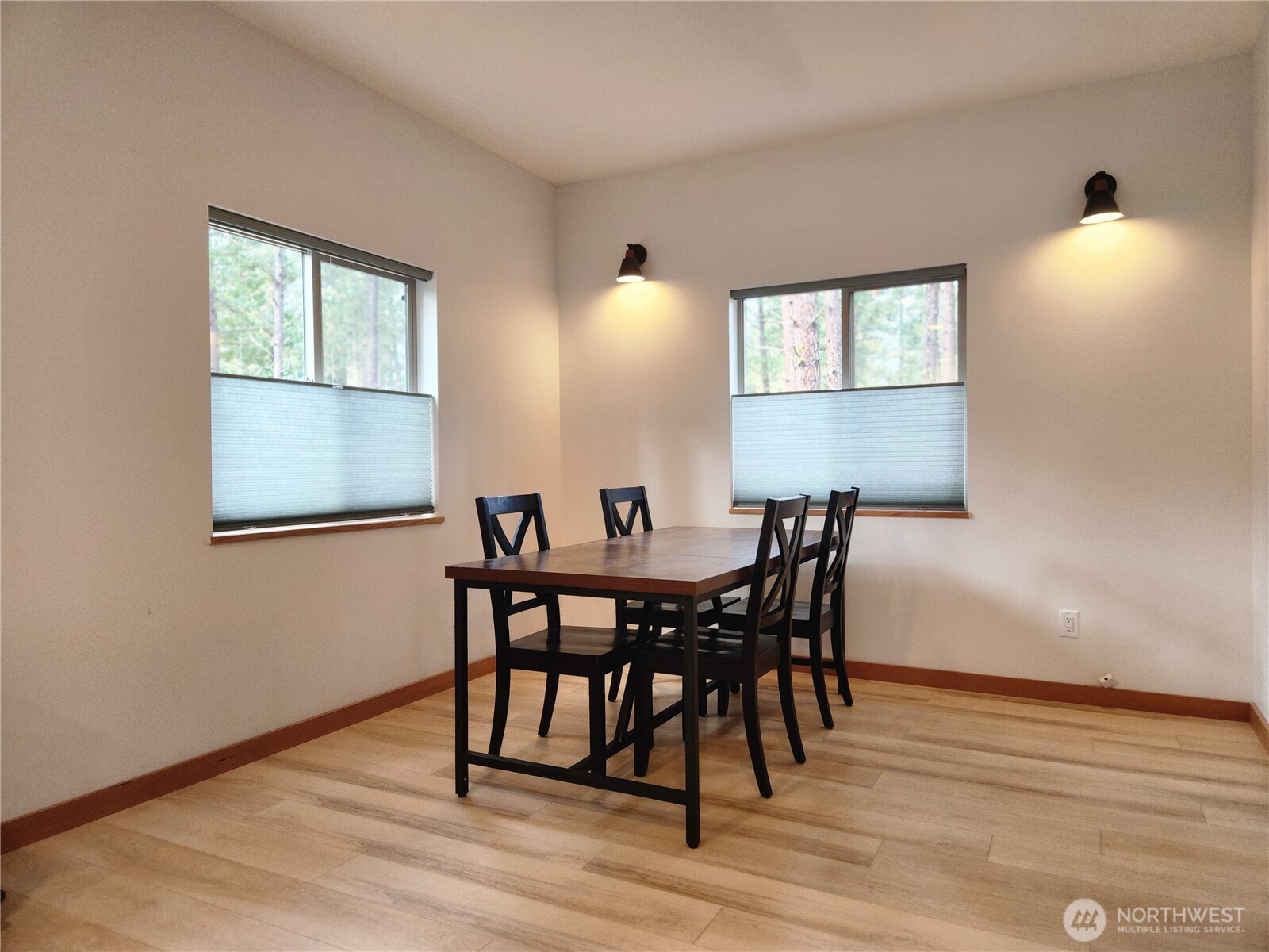 78 Homestead Road Winthrop, WA 98862 - Photo 6 of 40 a view of a dining room with furniture and wooden floor