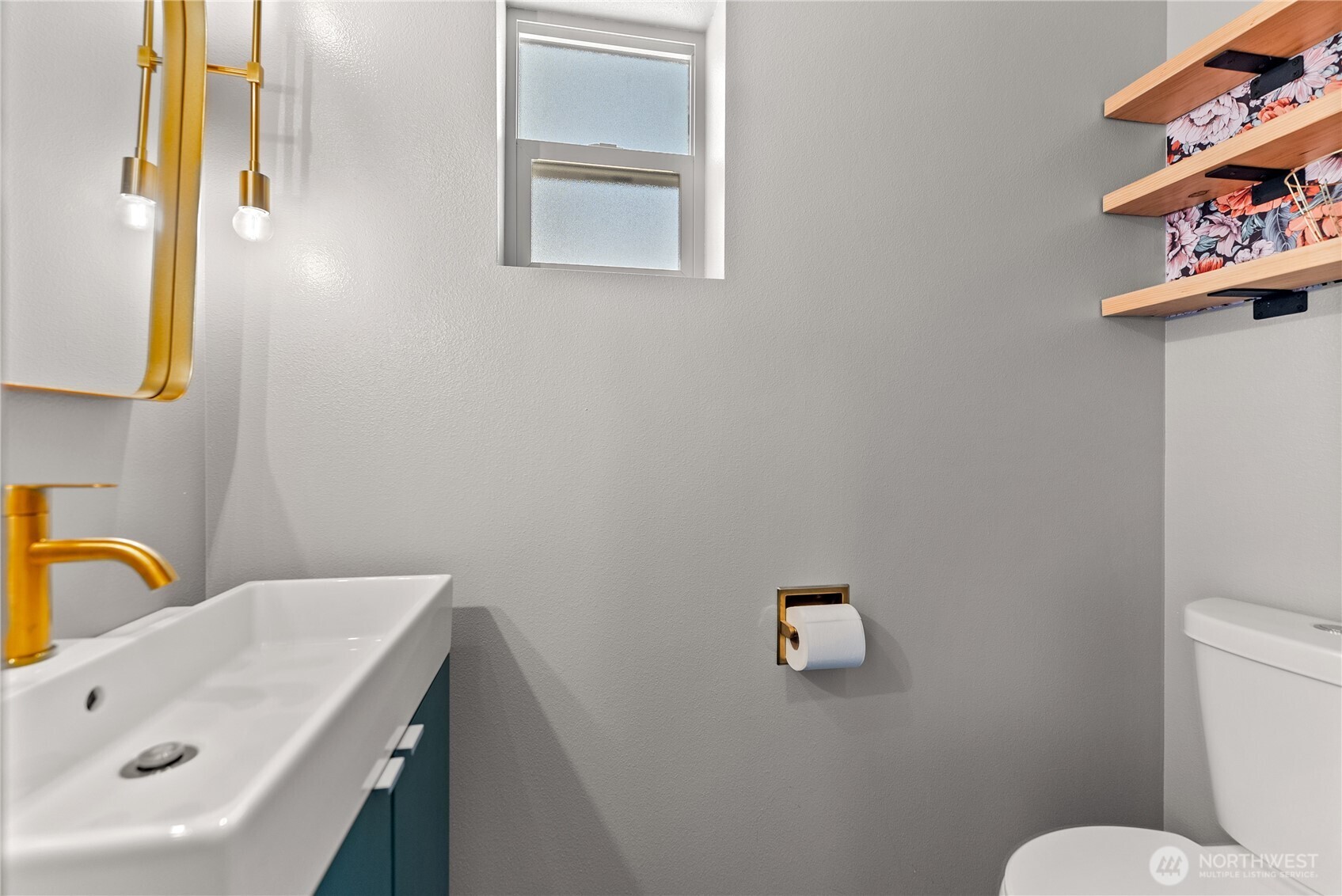 78 Homestead Road Winthrop, WA 98862 - Photo 9 of 40 a bathroom with a sink mirror and toilet