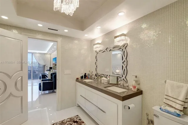 a bathroom with a double vanity sink a and mirror