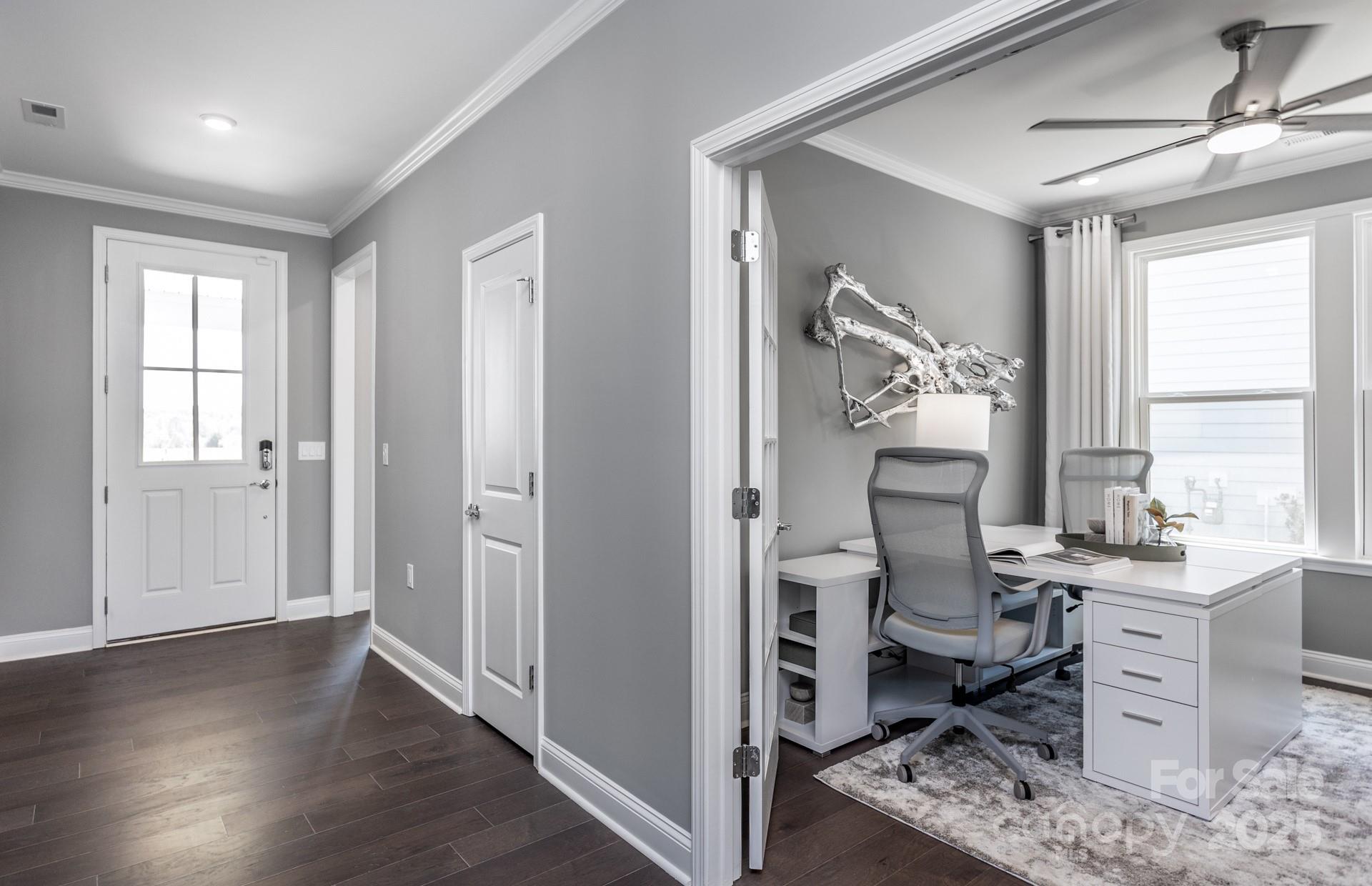 4796 Formation Court, Unit 68 Lancaster, SC 29720 - Photo 15 of 17 a very nice looking room with a large window and wooden floor