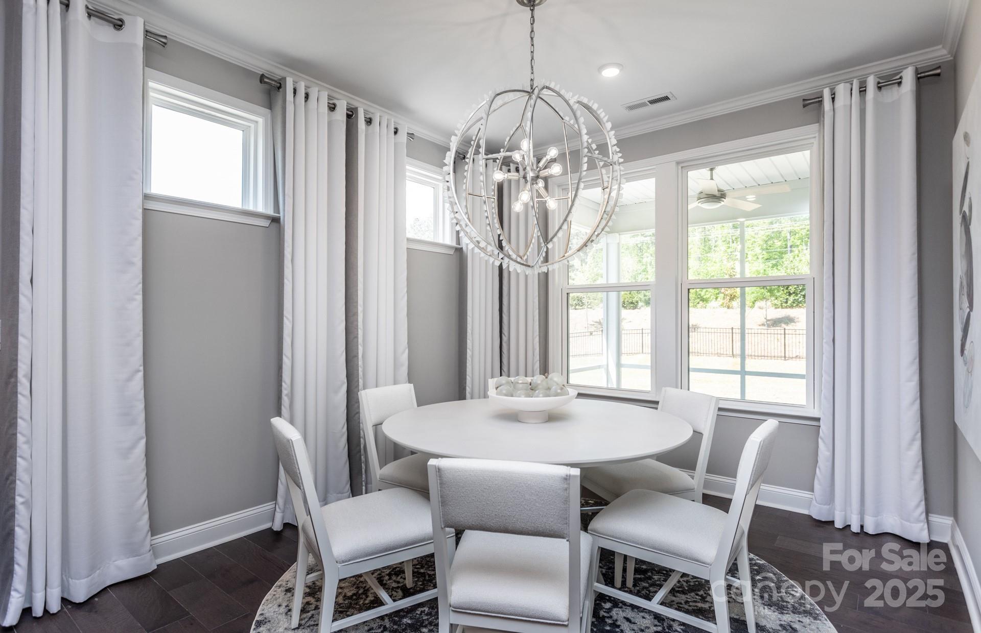 4796 Formation Court, Unit 68 Lancaster, SC 29720 - Photo 6 of 17 a view of a dining room with furniture window and outside view