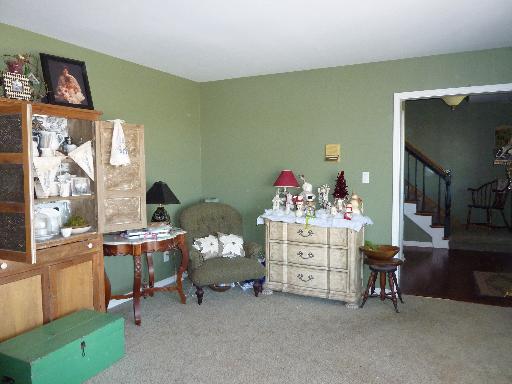 1N679 Harley Road Elburn, IL 60119 - Photo 3 of 16 a view of a workspace with furniture and a window