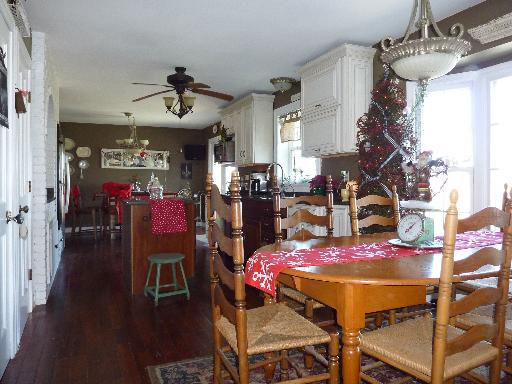 1N679 Harley Road Elburn, IL 60119 - Photo 6 of 16 a view of a dining room with furniture and wooden floor