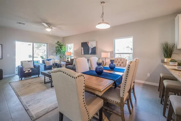 a view of a dining room with furniture