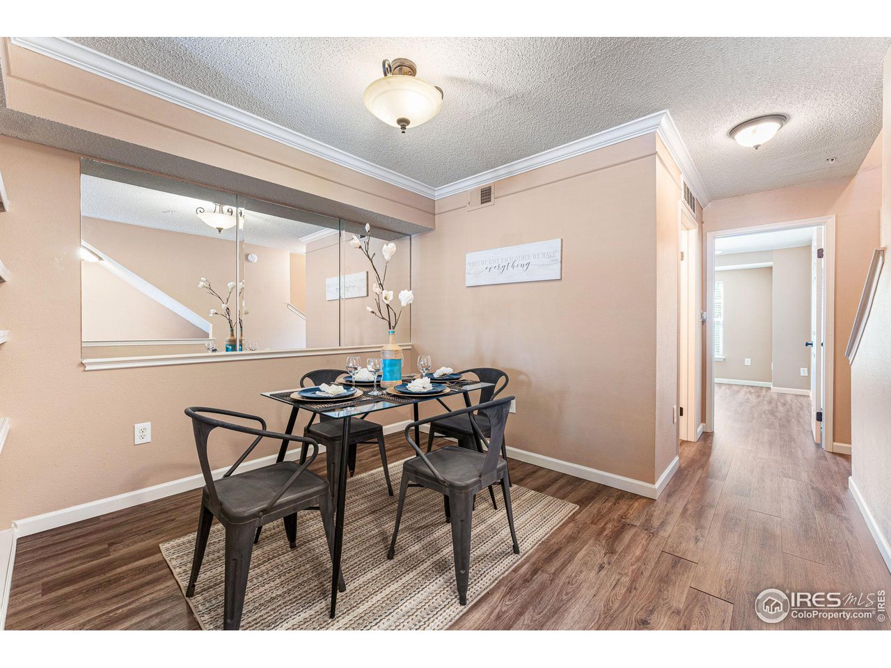 1839 Spaulding Circle Superior, CO 80027 - Photo 12 of 27 a view of a dining room with furniture and wooden floor