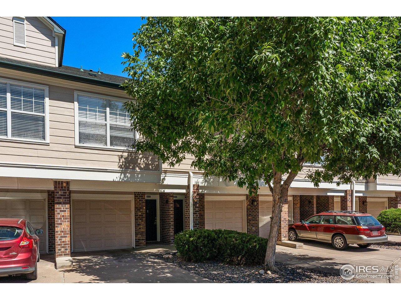 1839 Spaulding Circle Superior, CO 80027 - Photo 23 of 27 a front view of a house with trees