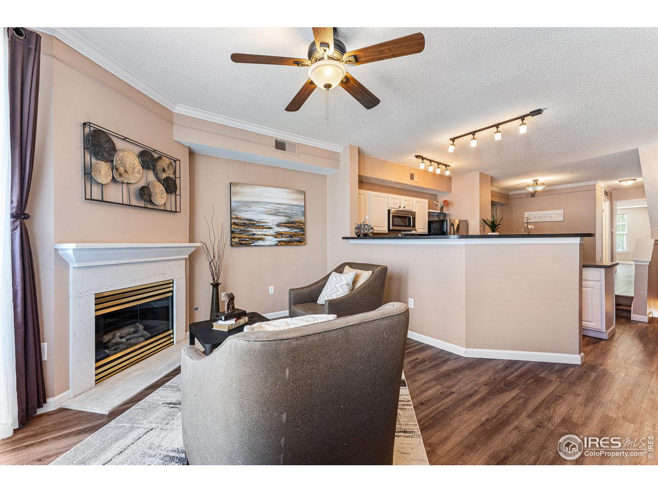 1839 Spaulding Circle Superior, CO 80027 - Photo 3 of 27 a living room with furniture and a fireplace