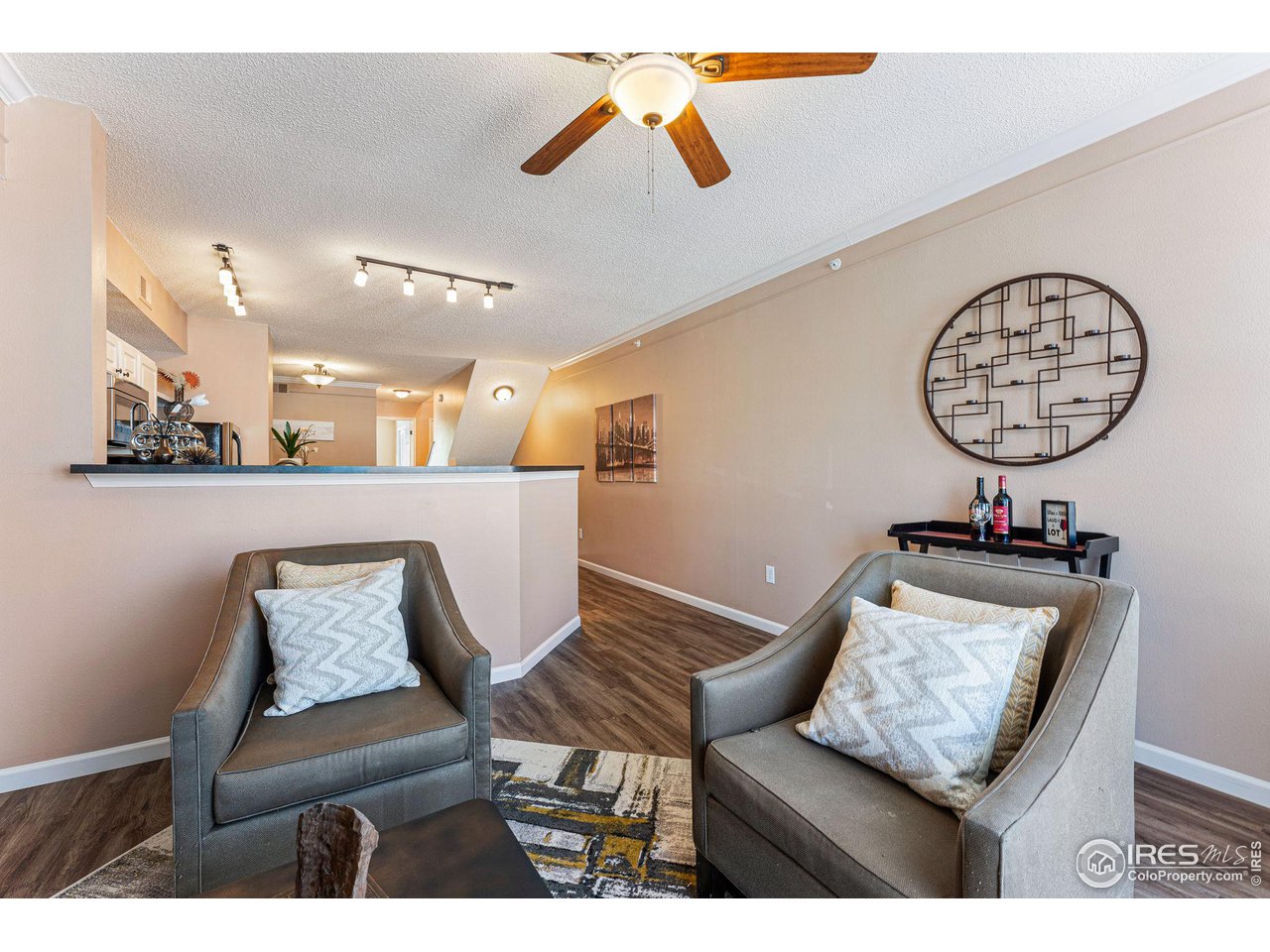 1839 Spaulding Circle Superior, CO 80027 - Photo 4 of 27 a view of a hallway with a couch and chandelier
