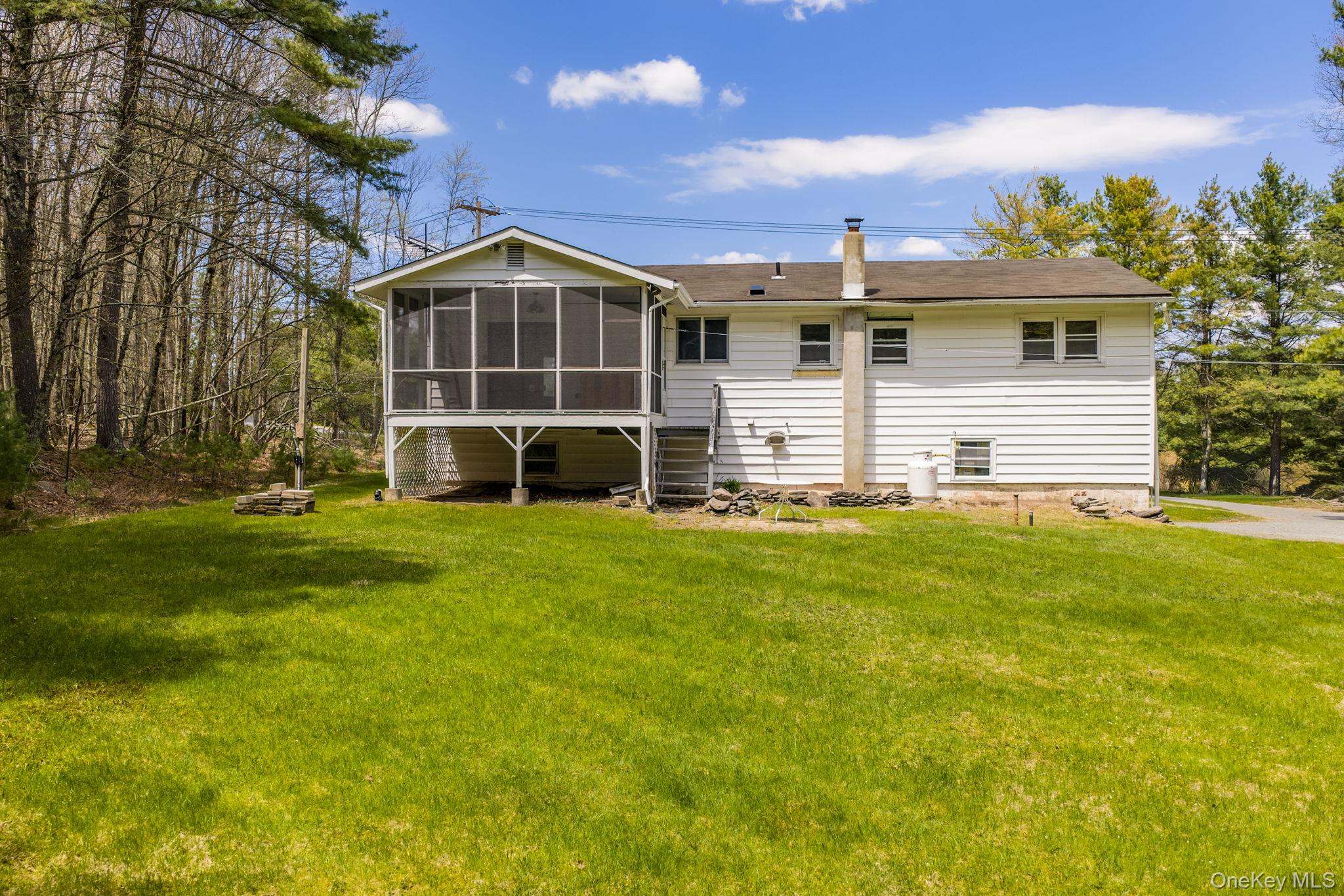 87 Airport Road Eldred, NY 12732 - Photo 26 of 30 a front view of a house with a yard