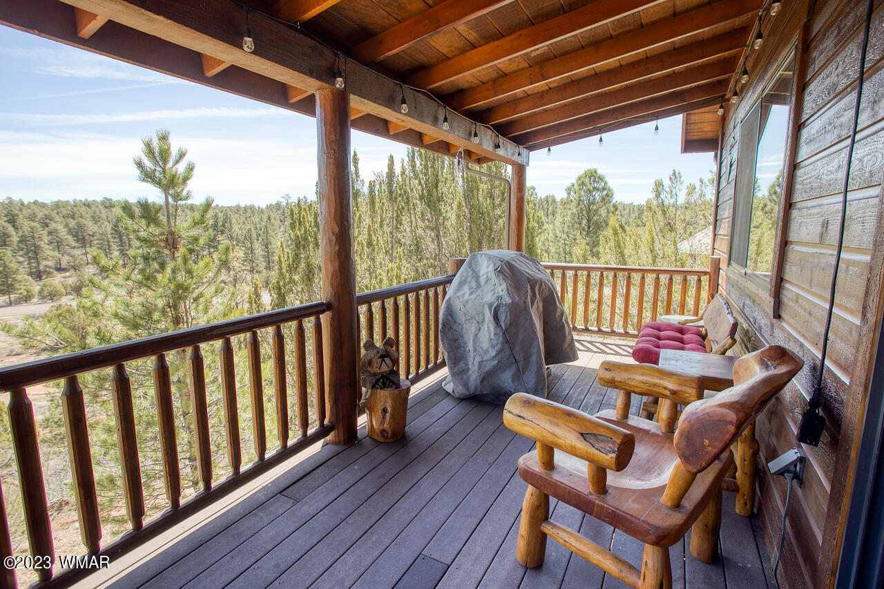 1911 North Bison Ridge Trail, Unit 10 Show Low, AZ 85901 - Photo 14 of 17 a view of porch with a furniture