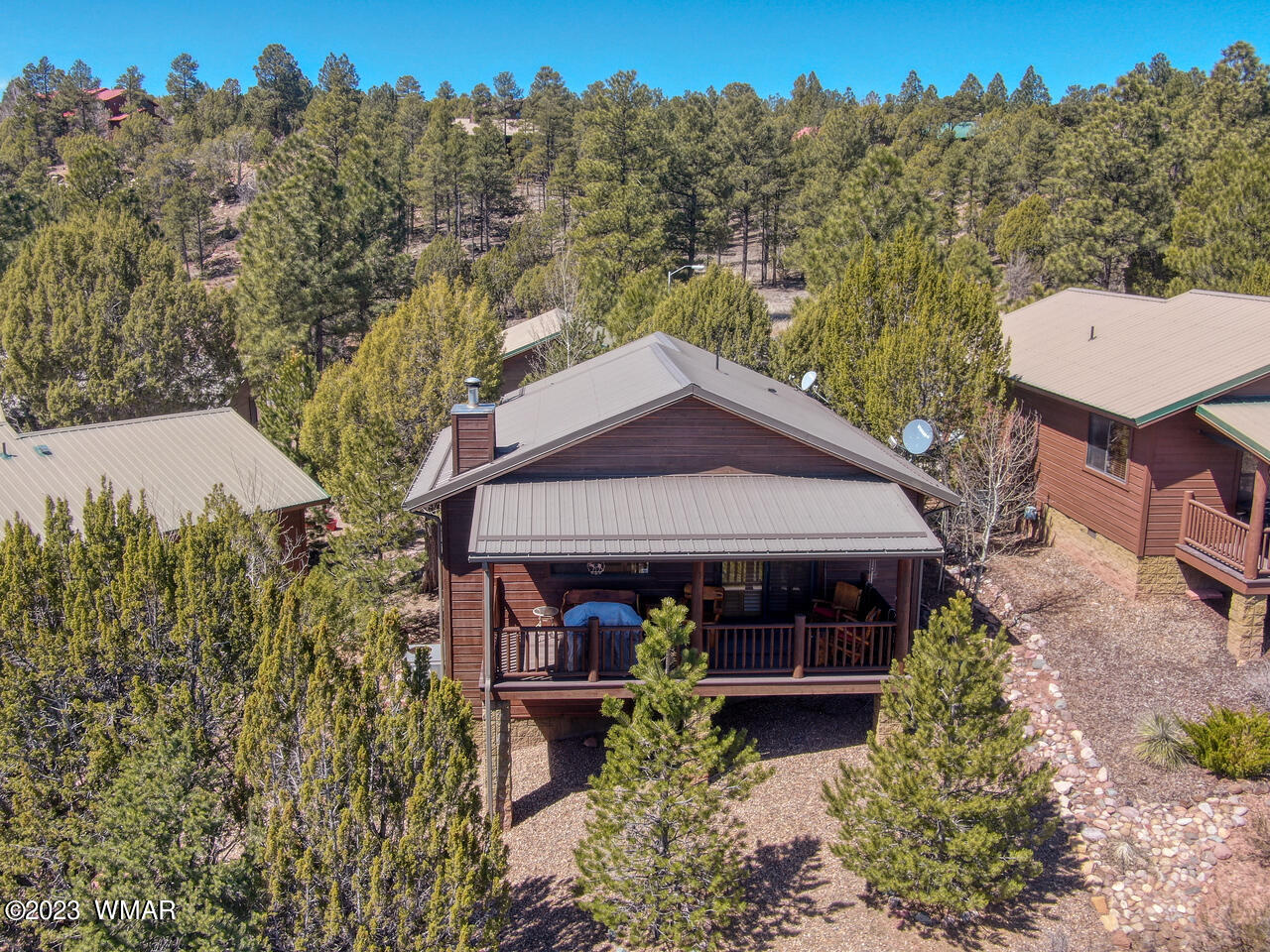 1911 North Bison Ridge Trail, Unit 10 Show Low, AZ 85901 - Photo 15 of 17 a view of house with outdoor seating