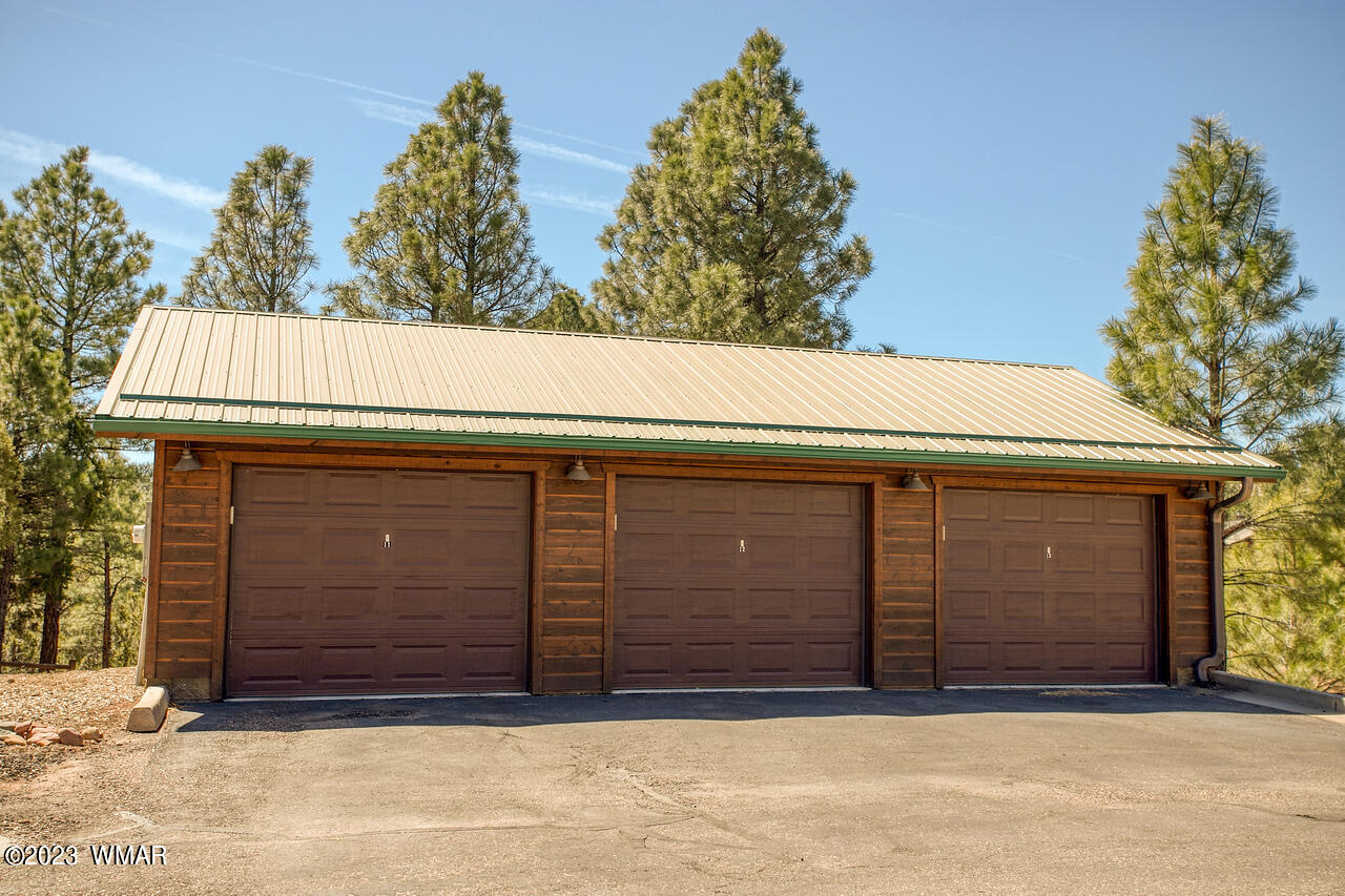 1911 North Bison Ridge Trail, Unit 10 Show Low, AZ 85901 - Photo 17 of 17 a view of outdoor space garage and garage