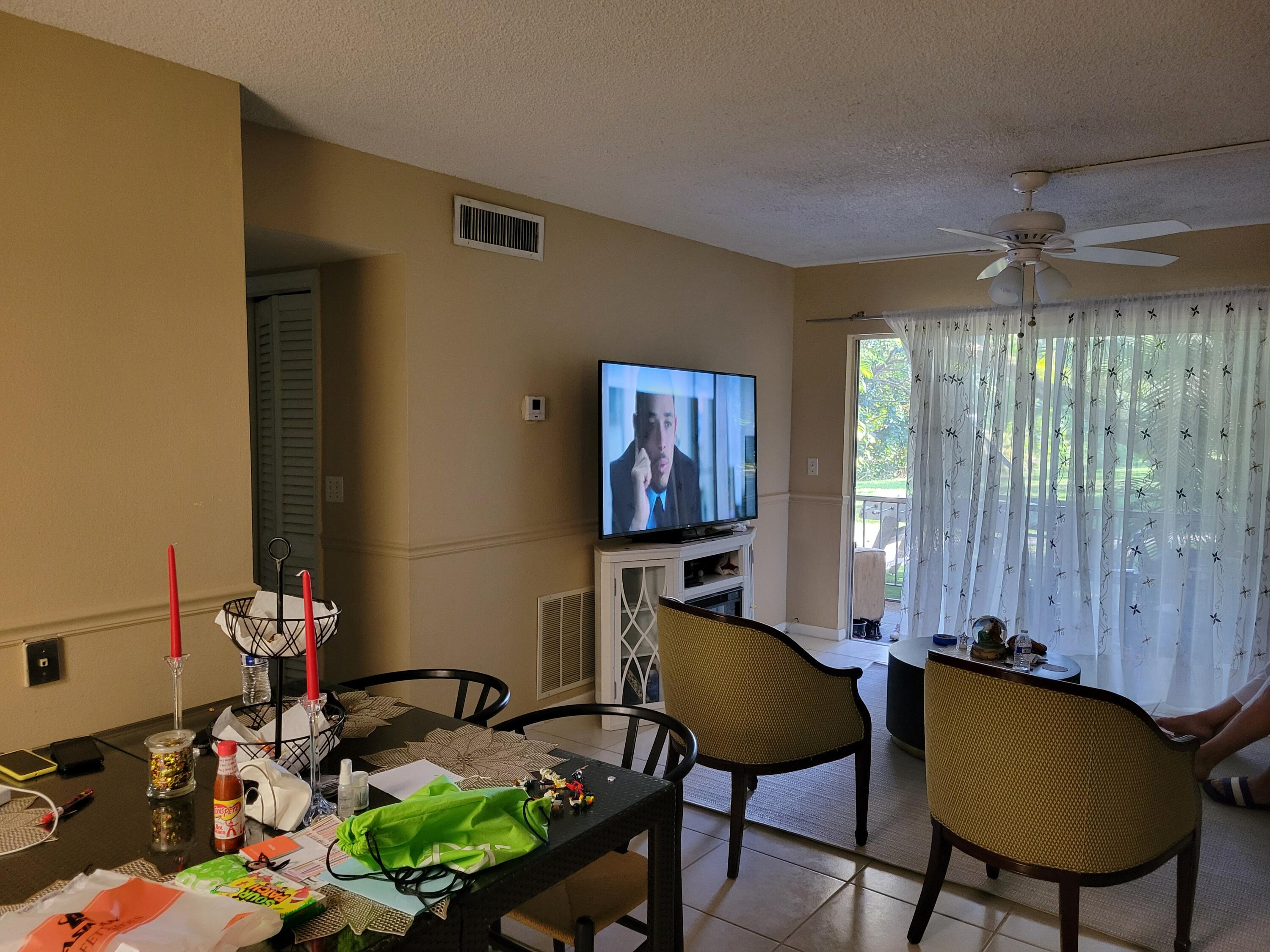 644 Northwest 13th Street, Unit 11 Boca Raton, FL 33486 - Photo 3 of 9 Living/dining romoms