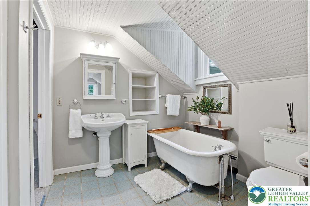 2014 Linden Street Bethlehem, PA 18017 - Photo 16 of 85 A quaint bathroom with a charming clawfoot tub and pedestal sink.