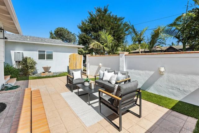 a building outdoor space with patio furniture