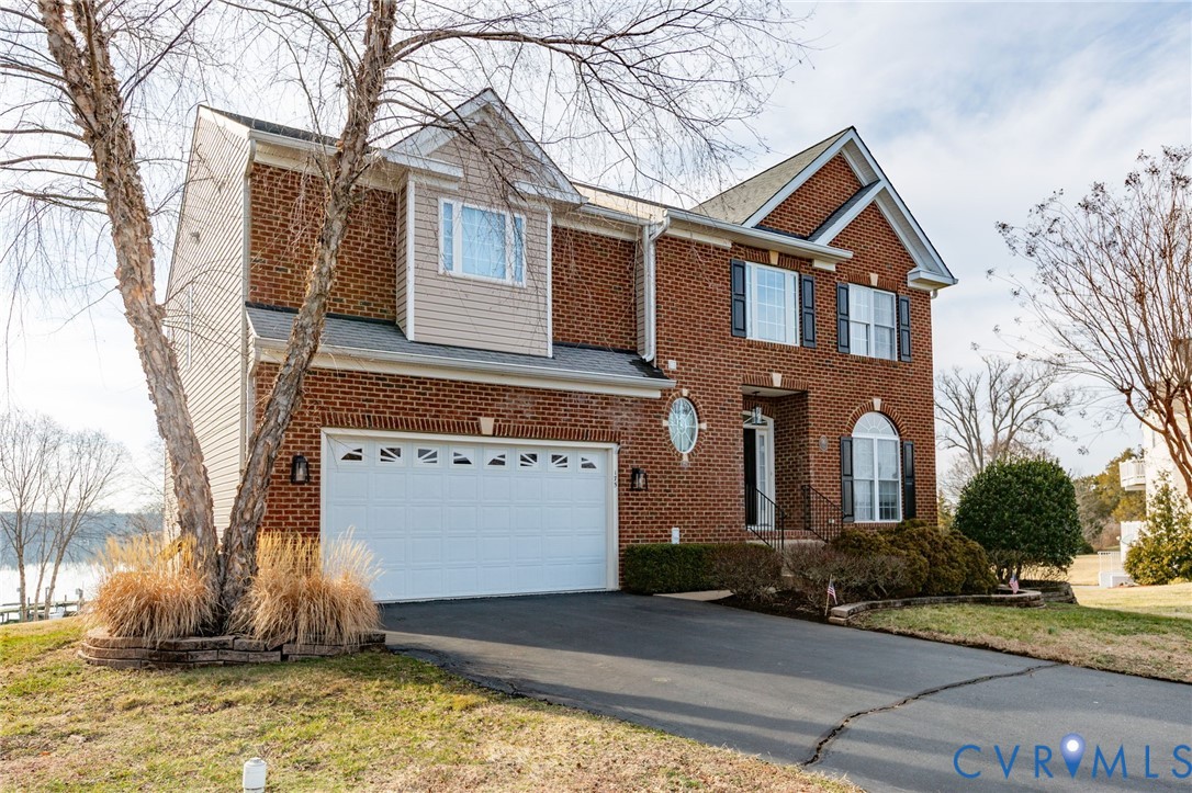 175 Shellfield Lane Colonial Beach, VA 22443 - Photo 81 of 100 View of front facade featuring driveway, a garage,