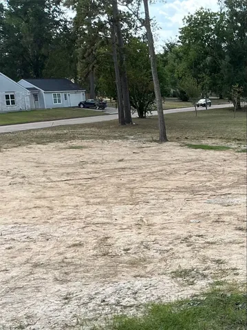 a view of a fountain in front of a house