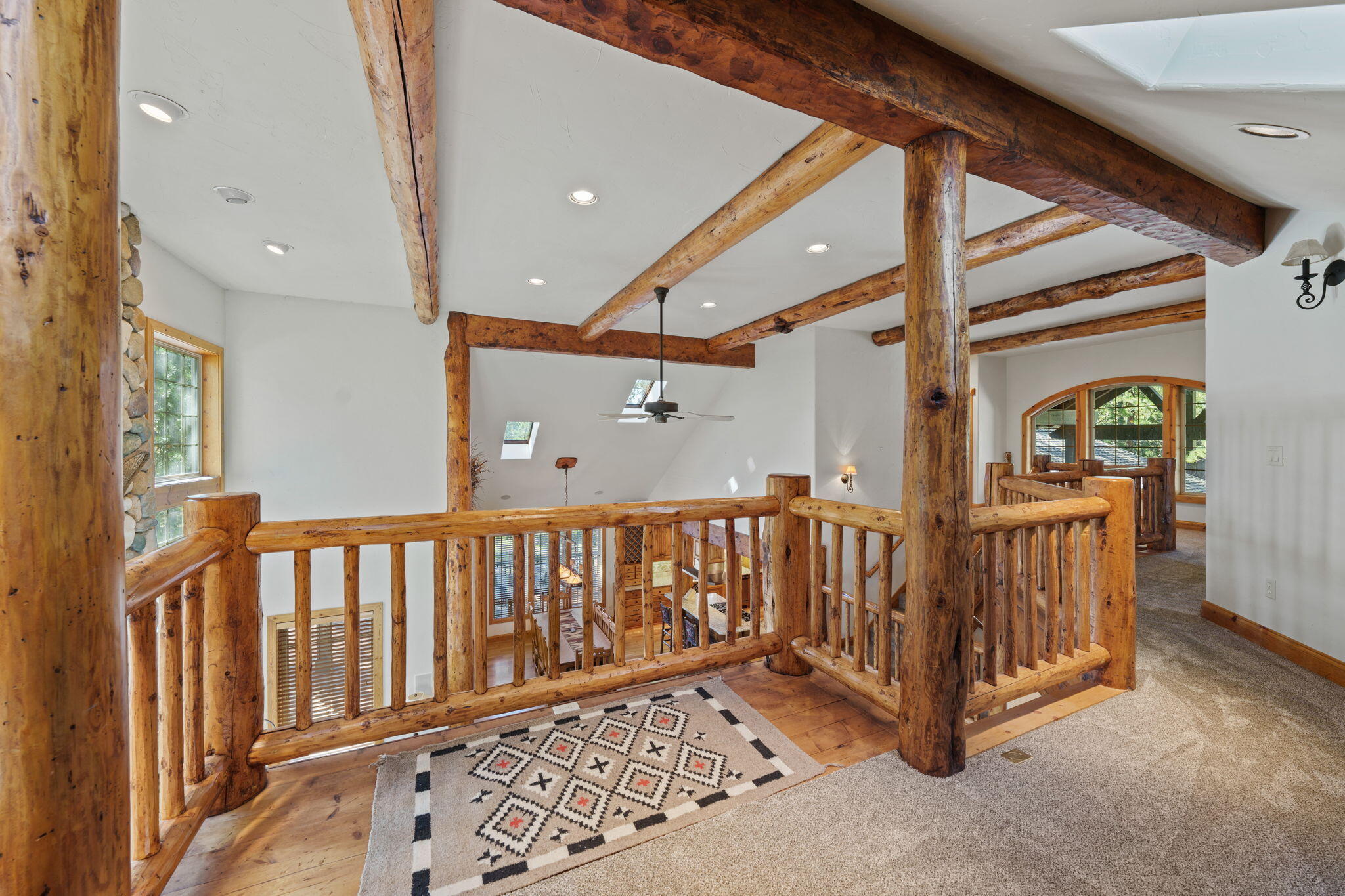 58026 Kinglet Road Sunriver, OR 97707 - Photo 26 of 39 a view of hallway with wooden stairs