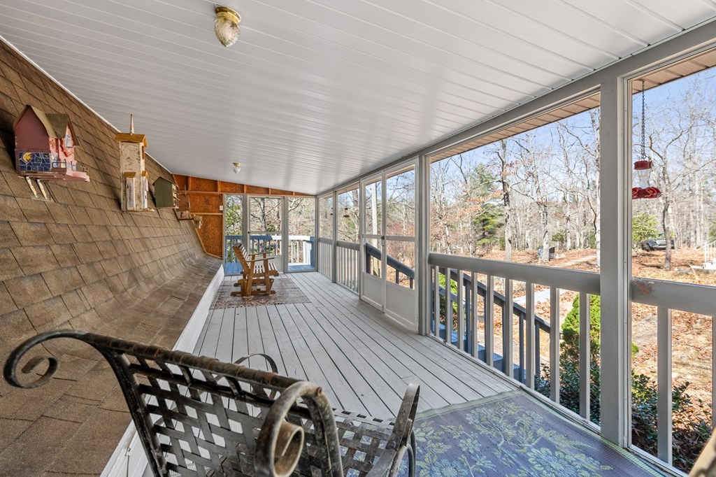 1262 Maple Grove Road Morganton, GA 30560 - Photo 24 of 68 a view of a couches chair and wooden floor