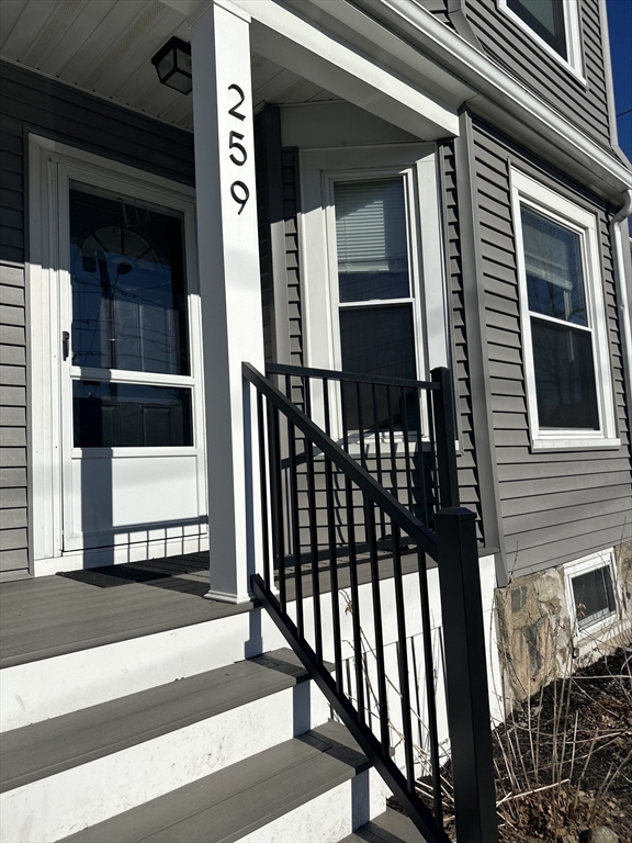a view of a house with a porch