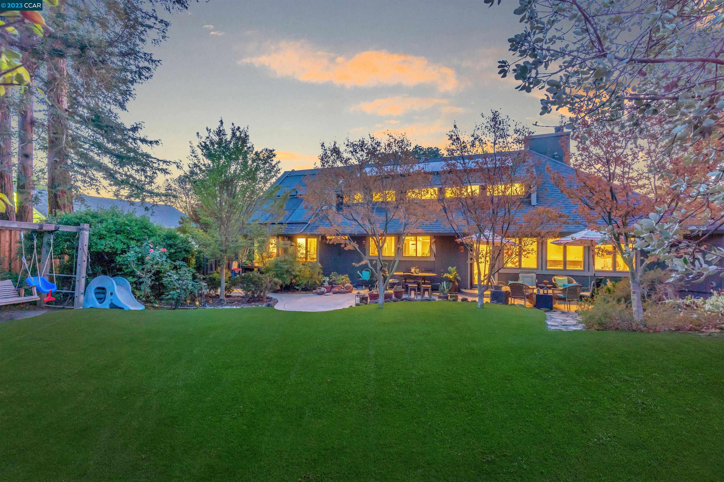 a view of a building with a yard