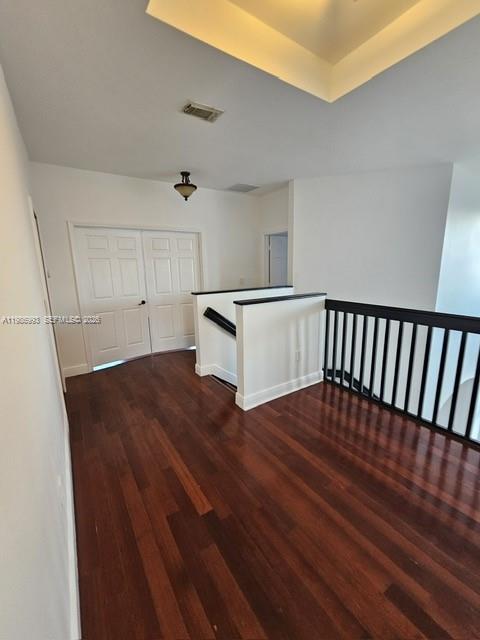 11151 Southwest 241st Street Homestead, FL 33032 - Photo 11 of 18 a view of a hallway with wooden floor