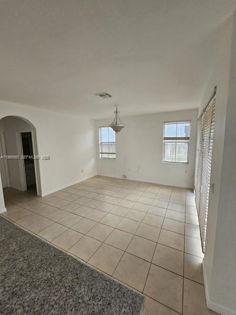 11151 Southwest 241st Street Homestead, FL 33032 - Photo 6 of 18 a view of empty room with windows
