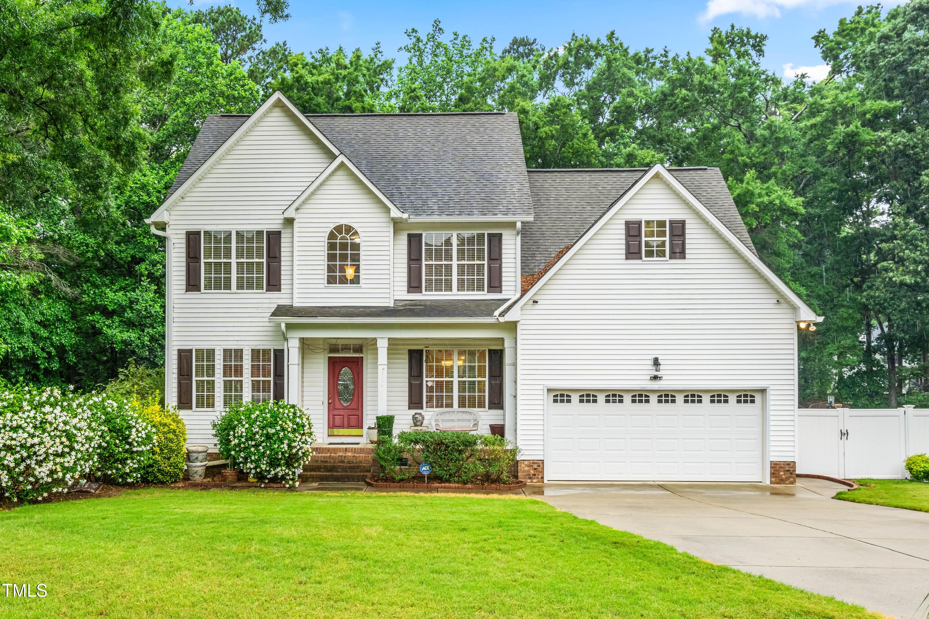 1420 Taylor Farm Road Raleigh, NC 27603 - Photo 1 of 30 a view of a house with a yard