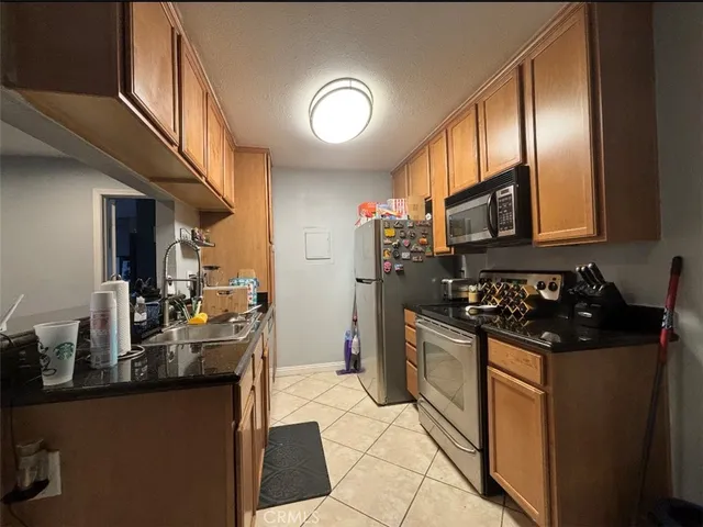 $410,000 | 1345 Cabrillo Park Drive, Unit E01, Santa Ana, CA 92701