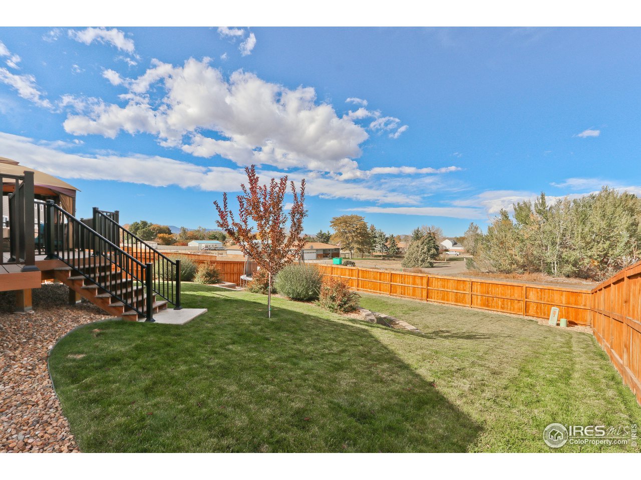 890 Wagon Bend Road Berthoud, CO 80513 - Photo 33 of 40 Fully Landscaped & Fenced Backyard