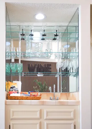 a room with furniture and a book shelf