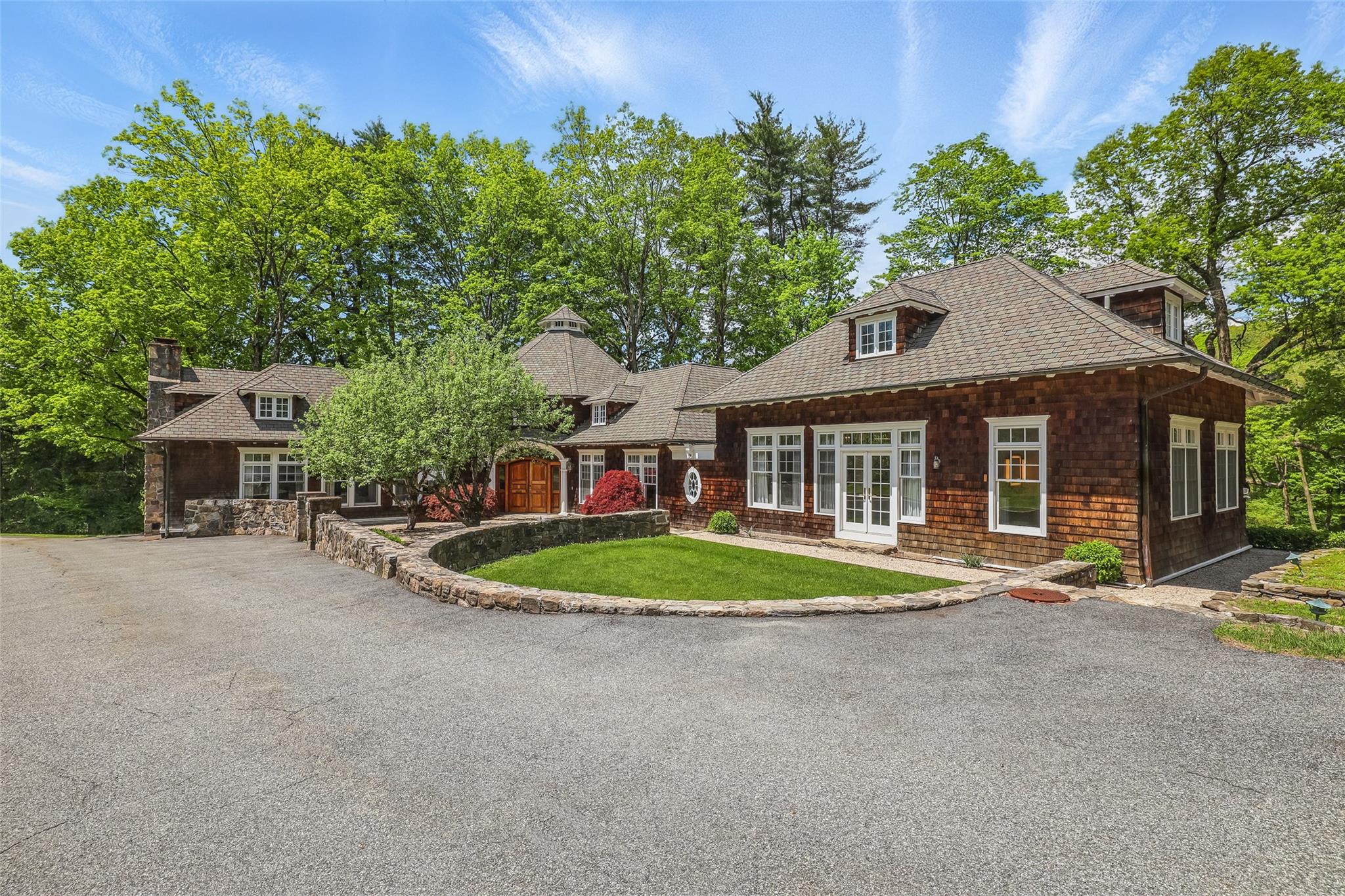 224 Chestnut Ridge Road Bedford Corners, NY 10549 - Photo 1 of 1 front view of a house with a yard