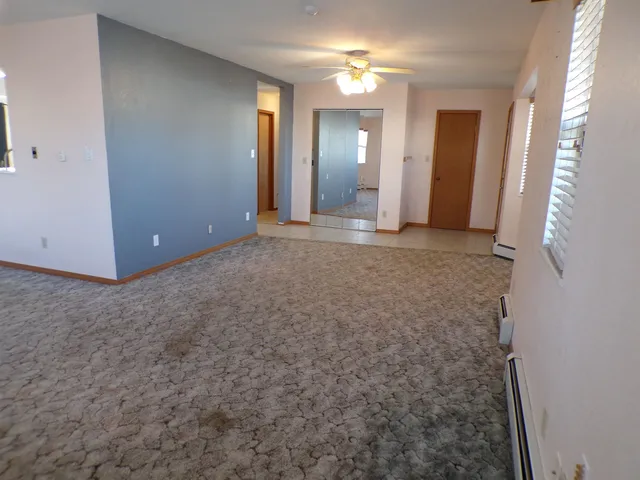 an empty room with a bathroom