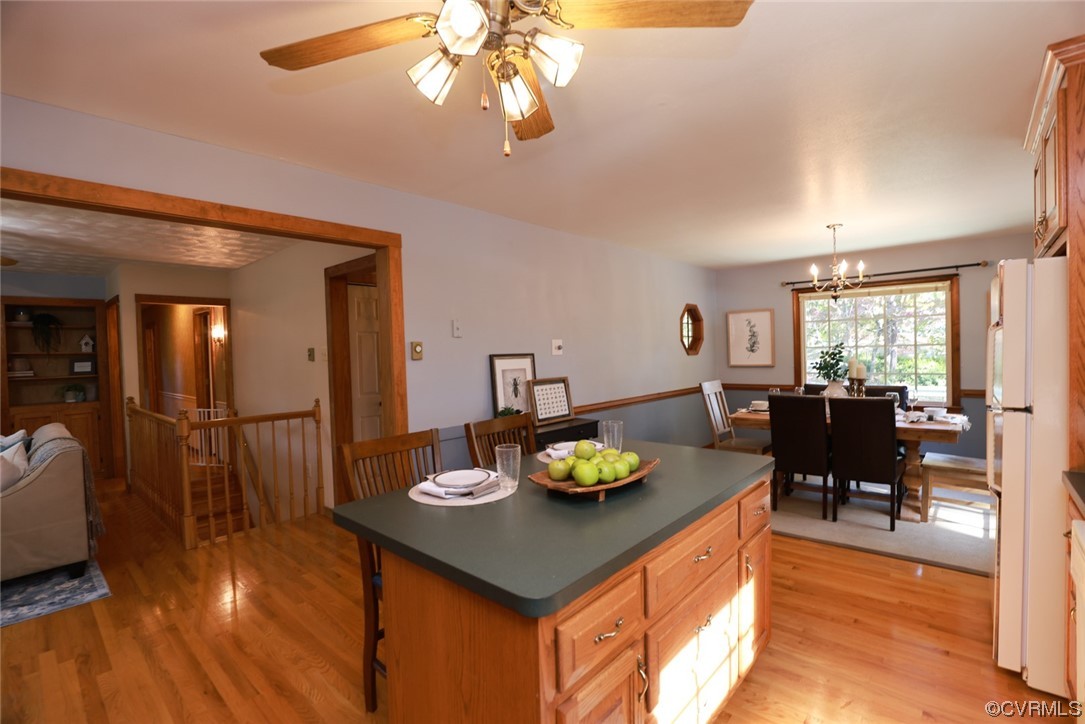 7317 Creighton Road Mechanicsville, VA 23111 - Photo 16 of 46 a kitchen with a table and chairs