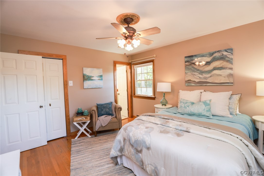 7317 Creighton Road Mechanicsville, VA 23111 - Photo 20 of 46 a bedroom with a bed mirror and a window