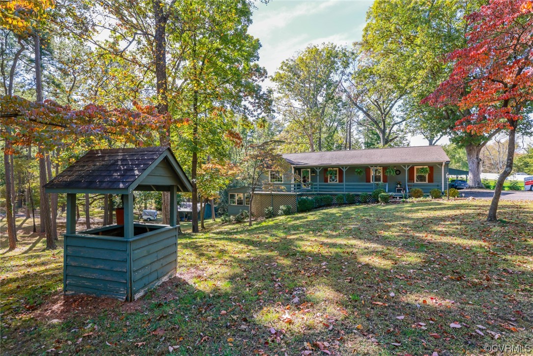 7317 Creighton Road Mechanicsville, VA 23111 - Photo 3 of 46 a front view of a house with a yard
