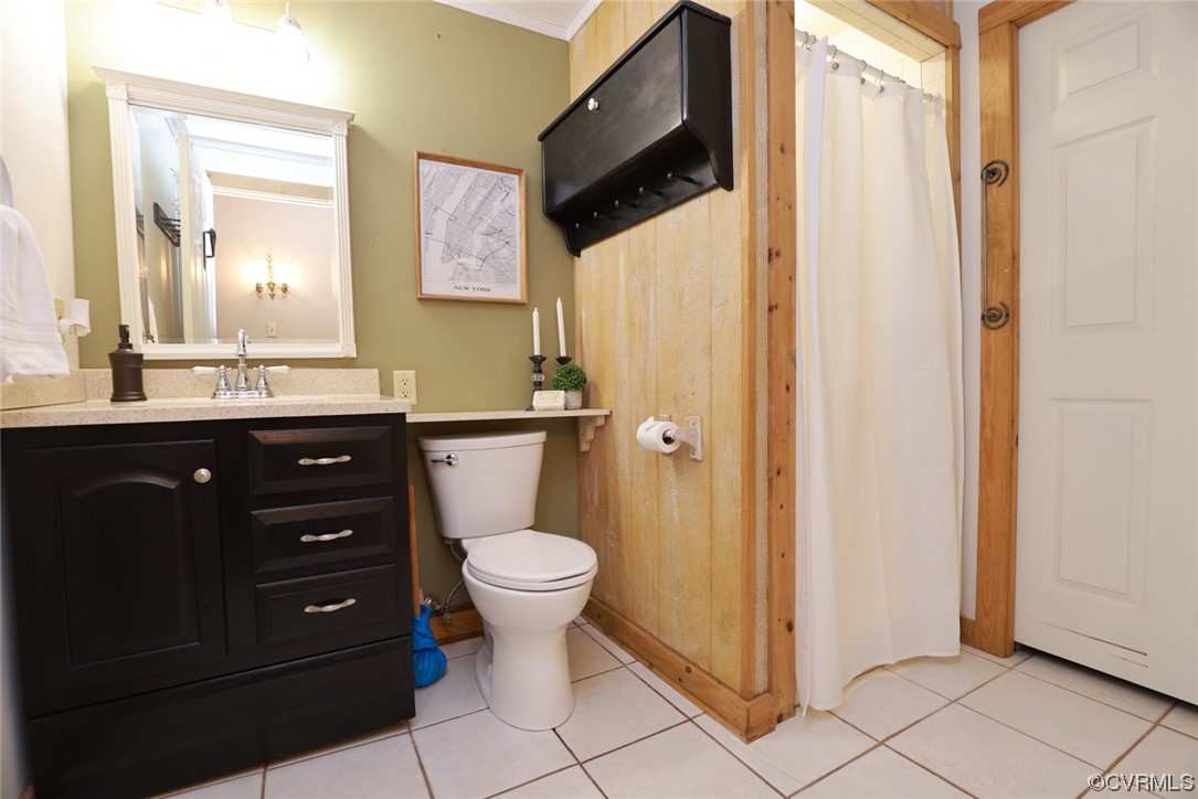 7317 Creighton Road Mechanicsville, VA 23111 - Photo 34 of 46 a bathroom with a sink a toilet a mirror and shower