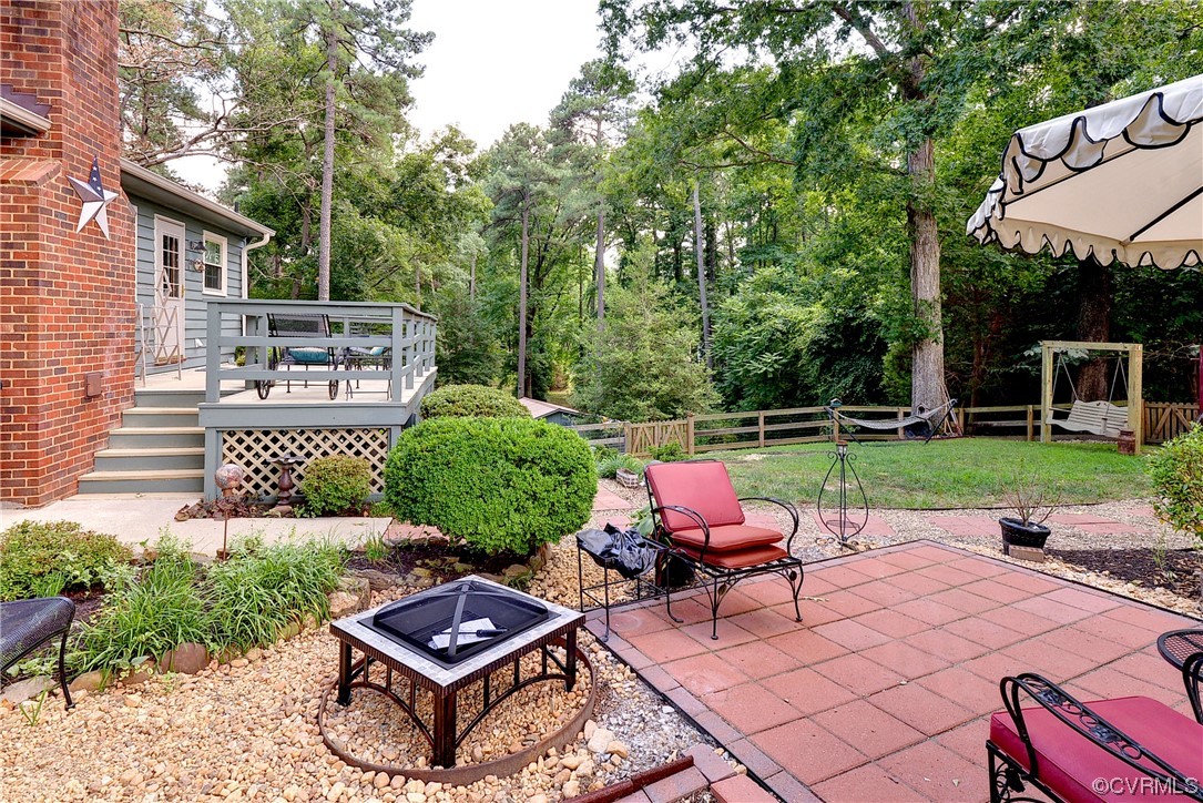 7317 Creighton Road Mechanicsville, VA 23111 - Photo 38 of 46 a view of backyard with seating space and trees